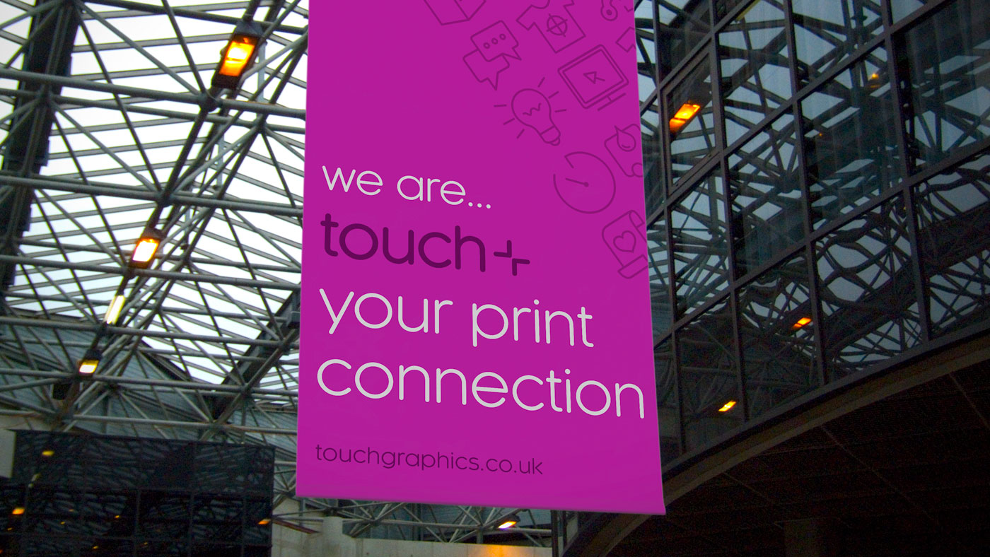 Touch brand applied to large format banner