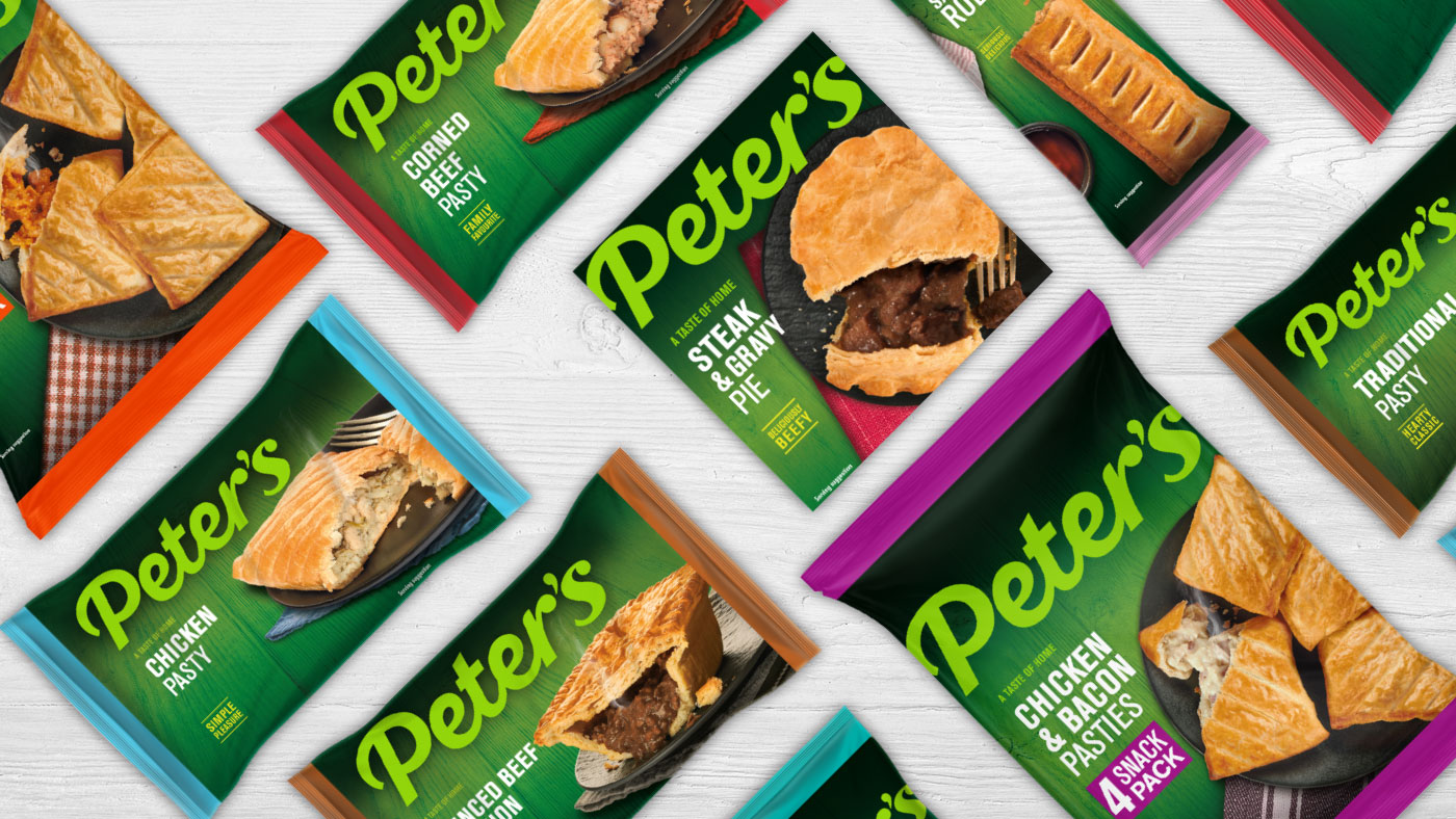 A selection of Peter's packaging on a white wooden table top