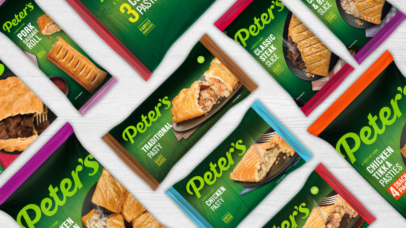 A selection of Peter's packaging on a white wooden table top