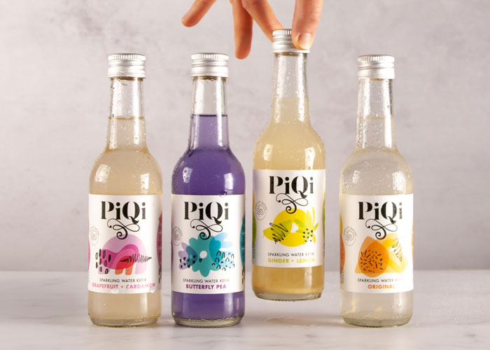An image of four drinks bottles